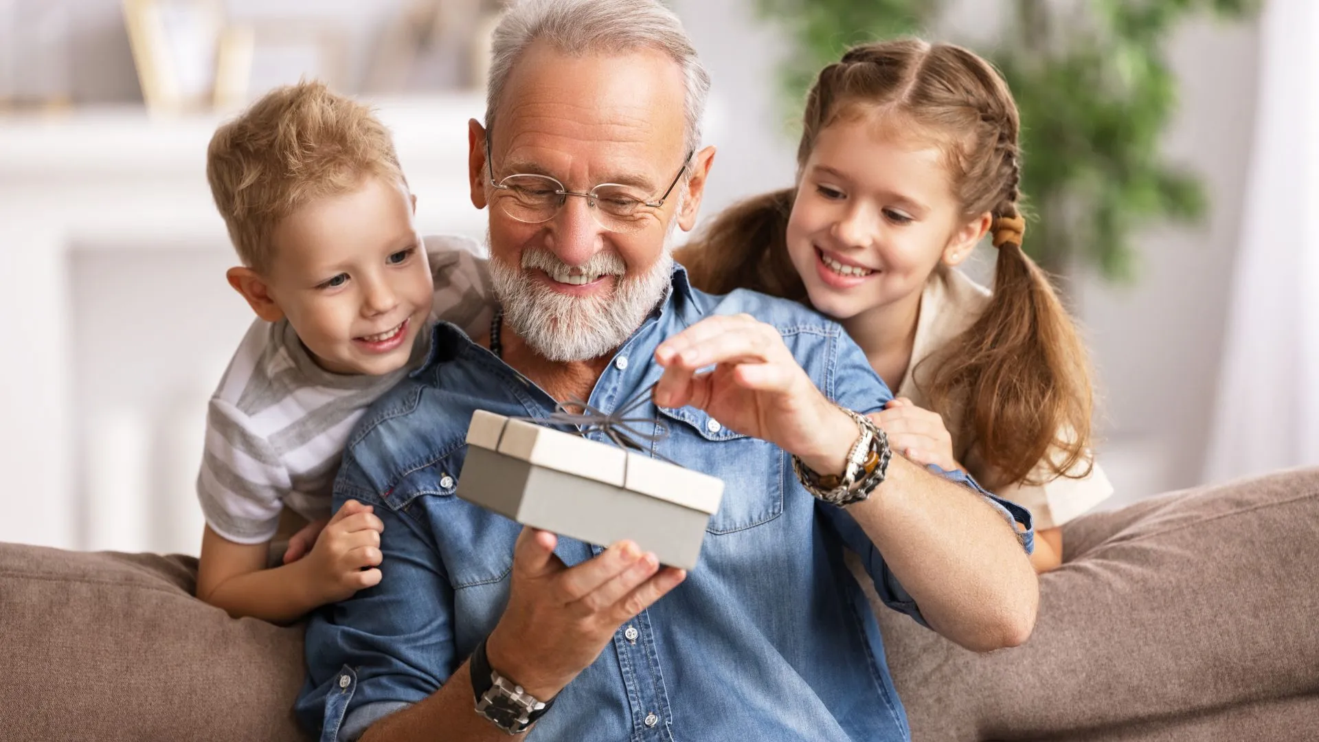 A grandfather enjoying a happy moment with his grandchildren